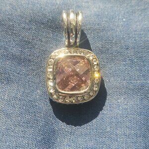 PENDANT WITH PINK FACETED GLASS CENTER STONE SURROUNDED BY RHINESTONES